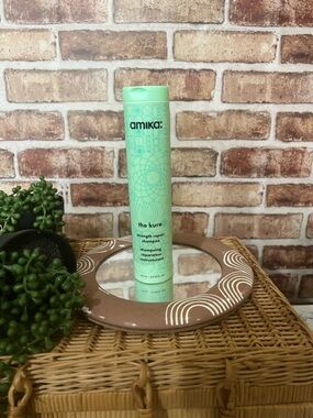 amika The Kure Strength Repair Shampoo - Mint Green Bottle